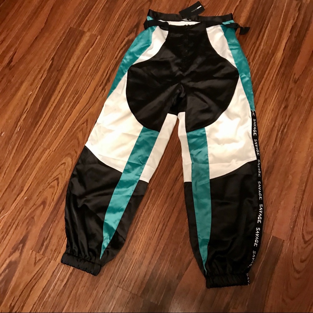 FashionNova satin-like jogger pants.